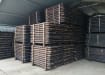 Creosote timber posts in storage