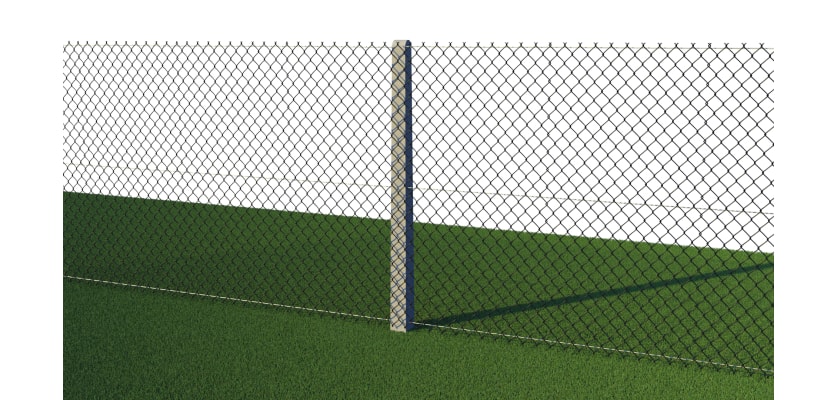 Intermediate concrete post holding up chain link fencing