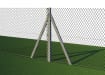 Concrete posts with green chain link mesh installed around field 