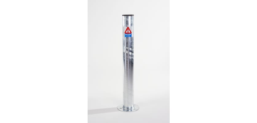 Galvanised fixed bollard with a rounded cap, designed for enhanced durability and visibility in outdoor environments.