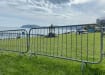 Crowd control around grass bank 