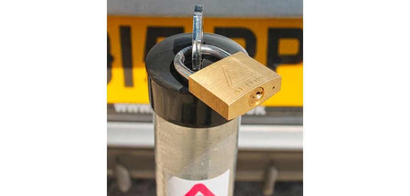 Padlock on parking post