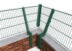 Showing how the Corner Posts for 0.6m High 60 Degree Crank Wall Mounted 868 Mesh Fencing attach to a wall