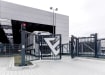 A FFL RapidFold Pro Double Leaf Gate outside of a Storage Depot