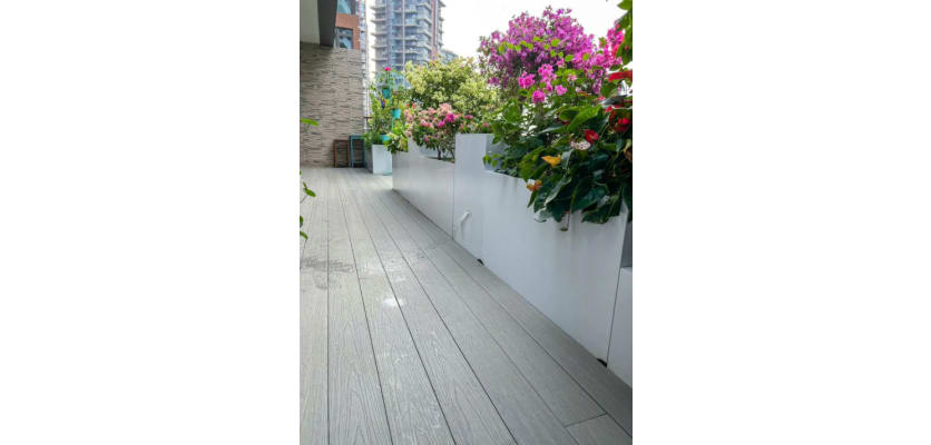 Grey Bambura® Wood Plastic Composite Advanced Deck Trim showcasing a sleek, modern design for outdoor spaces.