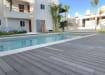 Bambura Composite Wood Decking Installed around a swimming pool
