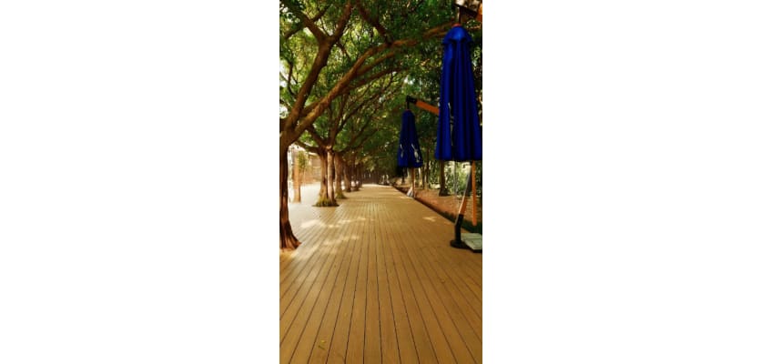 Teak Bambura Wood Plastic Composite Decking installed in a park
