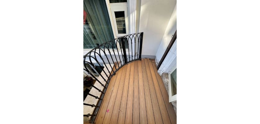 Teak Finish Bambura Wood Plastic Composite Decking Installed on a Balcony