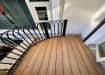 Teak Finish Bambura Wood Plastic Composite Decking Installed on a Balcony
