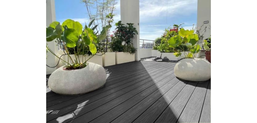 Charcoal Finish Bambura Wood Plastic Composite Decking installed on a rooftop garden 