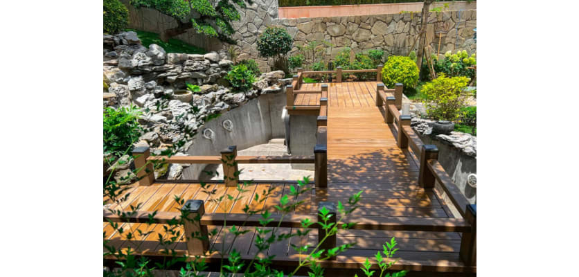 Bambura Wood Plastic Composite Decking installed on a walkway - Teak Finish