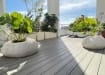Grey Bambura® Wood Plastic Composite essential deck board showcasing a modern, durable design suitable for outdoor decking projects.