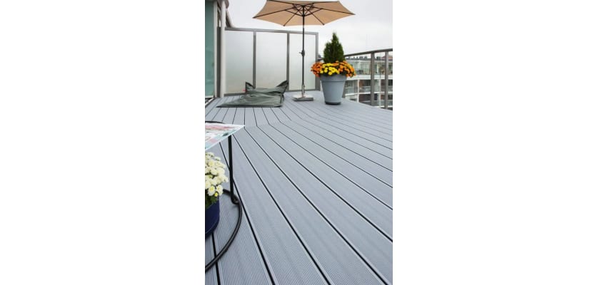 Grey plastic decking boards installed on balcony