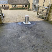 Benito H6006 Stainless Steel Automatic Telescopic Hydraulic Bollard Kit installed outside house
