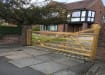 A 1.2m High PAR Softwood Timber Ranch Gate installed outside a house