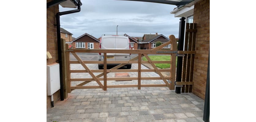 A 1.2m High Hardwood TImber Ranch Gate installed on a driveway