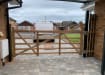 A 1.2m High Hardwood TImber Ranch Gate installed on a driveway