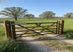 A 1.2m High Sawn Softwood Timber Field Gate installed on a Rural Pathway