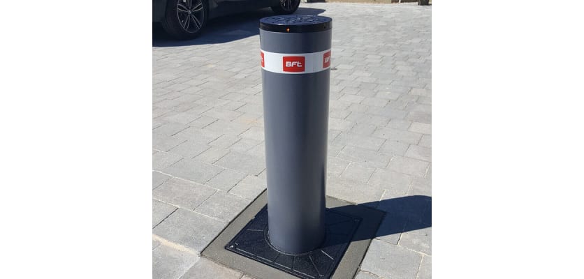 An Installed BFT Stoppy B 700 Automatic Bollard - Grey Finish