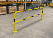 48mm diameter black and yellow hopped barrier installed in a warehouse