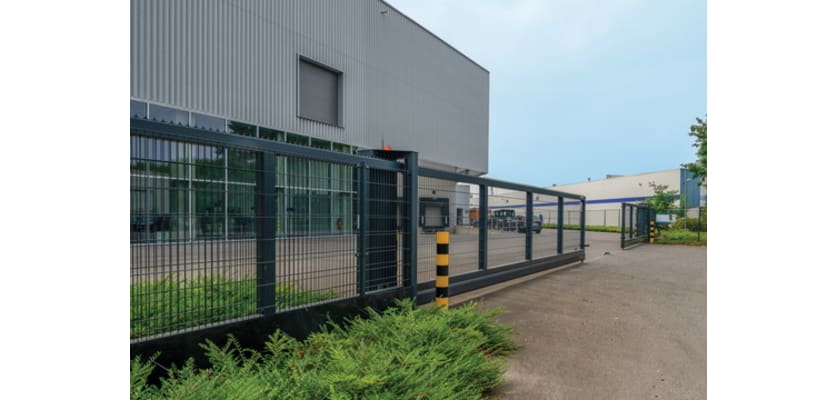 FFL 200 Manual 358 Prison Mesh Cantilever Gate installed outside warehouse 