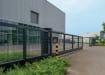FFL 200 Manual 358 Prison Mesh Cantilever Gate installed outside warehouse 