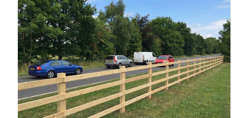 Timber post and rail installed alongside the road