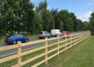 Timber post and rail installed alongside the road