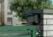 Locinox Panther Hydraulic Gate Closer for Wall and Post Mounting installed on brick post