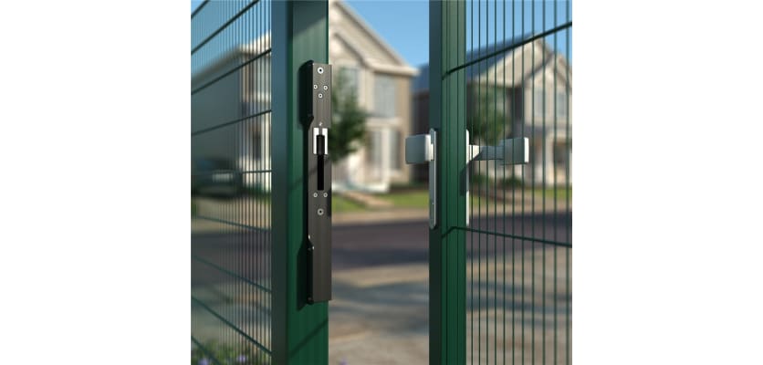 Locinox Intralec Built-In Electric Keep installed in a green mesh gate