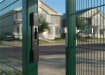 Locinox Intralec Built-In Electric Keep installed in a green mesh gate