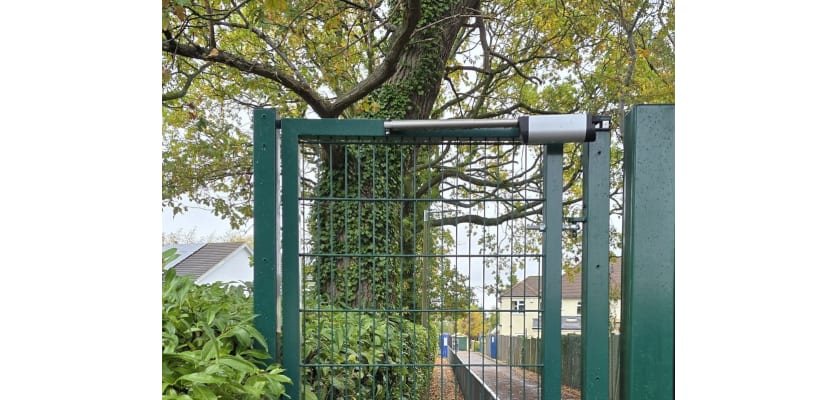 Semi-automatic pedestrian gate kit installed on a gate