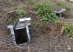 Heavy-duty metal Badger Gate designed for livestock and wildlife control