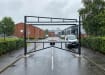 Black Double Swing Barrier installed at a commercial property