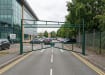 Grenn Double Swing Barrier with High-Level Swing Arm Kit at a staff car park
