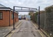 Black Swing Height Restrictor Barrier installed in a private car park