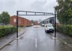 Black Swing Height Restrictor Barrier installed at a private car park
