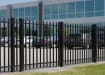 OldStead Welded Commercial 2 Rail Spear Top Walk Gate installed outside office parking