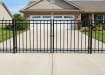 OldStead Welded Residential 3 Rail Flat Top Drive Gate installed outside property