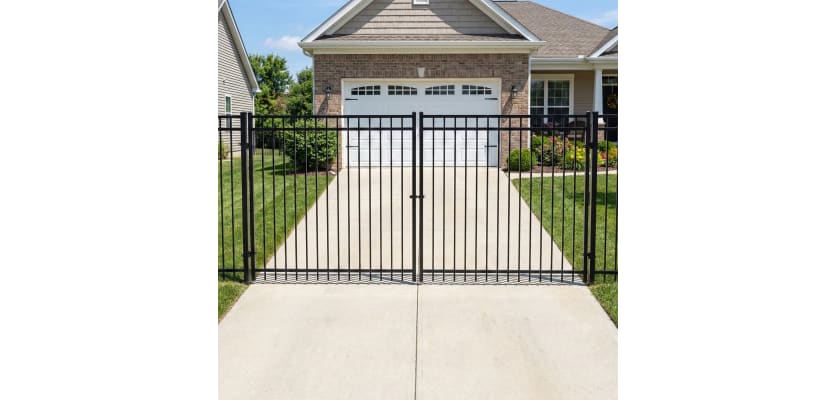 OldStead Welded Residential 3 Rail Flat Top Drive Gate installed in front of house