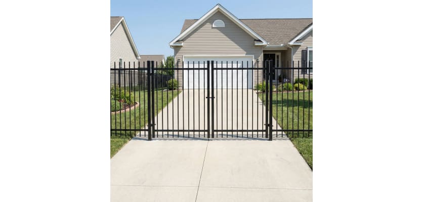 OldStead Welded Commercial 2 Rail Extended Top Drive Gate in front of property 