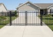OldStead Welded Commercial 2 Rail Extended Top Drive Gate in front of property 