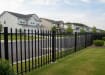 OldStead Welded Residential 70" 2 Rail Spear Top Fencing installed outside house 
