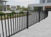 OldStead Welded Commercial 46" 2 Rail Flat Top Fencing outside shopping mall