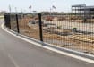 Mesh fencing installed at a roadside