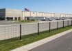Mesh fencing installed outside a shipping facility