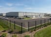 Mesh fencing installed around a warehouse