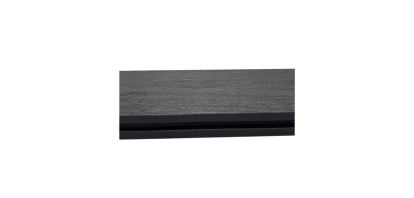 Side profile of a composite deck board with a charcoal finish