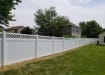 White vinyl fencing installed around a yard