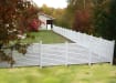 White vinyl fencing installed around a yard